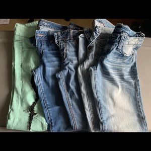 Five pairs of AE jeans